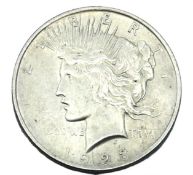 A 1923 US 0.900 silver Peace dollar, 26.9g