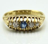 An Edwardian 18ct gold ring set with sapphire & ap