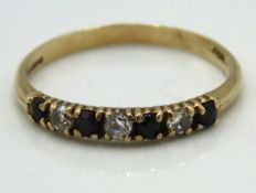 An 18ct gold diamond & sapphire ring, approx. 0.21
