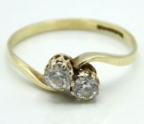 A 9ct gold diamond crossover ring set with approx.