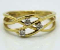 A 9ct interwoven gold three stone illusion set dia