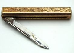 A yellow metal antique folding knife, 43mm wide cl