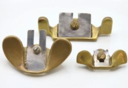 Three brass spoke shave planes