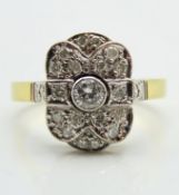 A late 1960s art deco style 18ct gold ring set wit