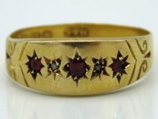 An Edwardian 18ct gold diamond & ruby set ring dat