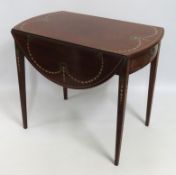 A Regency period mahogany Pembroke table with hand