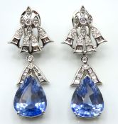A pair of 18ct white gold earrings set with sapphire, possibly lab-grown (unable to confirm as per T