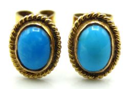 A pair of 9ct gold earrings set with turquoise, 10