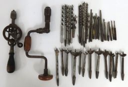 A brace & bit drill, a hand drill & a selection of
