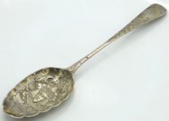 An 1802 George III London silver berry spoon with