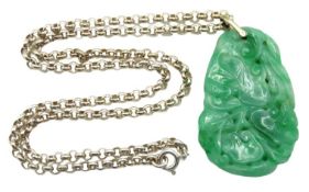 A 20thC. Chinese jade pendant with lily pad design