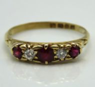 An 18ct gold ring set with ruby & diamond of appro