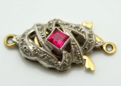 An 18ct gold art deco clasp set with diamond & rub