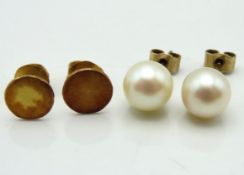 A pair of yellow metal collar studs/earring mounts