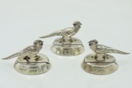 Three 1912 Birmingham silver place card holders depicting pheasants by Sampson Mordan & Co. 45mm wid