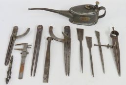 A selection of engineers tools including dividers