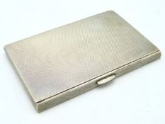A 1954 Sheffield silver cigarette case with machin