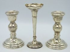 A pair of 1915 Birmingham silver candlesticks by Charles S. Green Ltd. , some faults, twinned with a