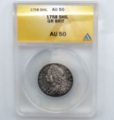 A graded 1758 George II silver shilling, grade AU5