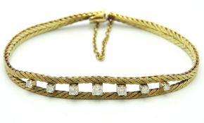A 14ct gold bracelet set with approx. 0.61ct of di