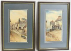 A pair of framed watercolours depicting Cornish st