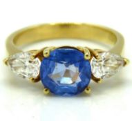 An 18ct gold ring set with a 19thC. Ceylon sapphir