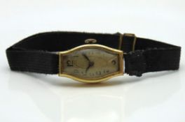 A ladies 18ct gold cased wristwatch, not running,