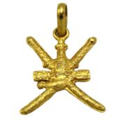 An 18ct gold national emblem of Oman pendant, 30.5