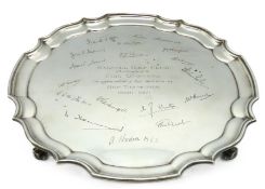 A 1911 footed Birmingham silver salver by J. B. Chatterley & Sons Ltd. presented to Eric Simpson of