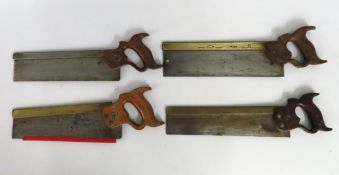 Four hand saws, two with brass spines including on