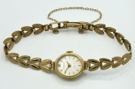 A ladies 9ct gold Accurist wristwatch, winds & run