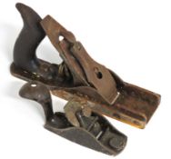 A small block plane, possibly a Stanley no. 100 twinned with one other