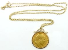 A 9ct gold mounted 1909 Edward VII full gold sover