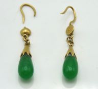 A pair of antique yellow metal jade drop earrings, test as 18ct gold, one a/f, drop 42mm, 3.5g