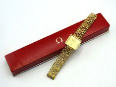 A boxed ladies 1960s avantgarde 18ct gold Omega De Ville wristwatch with a Gilbert Albert designed '