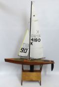 A large vintage model yacht marked GBR 4025, 1300m