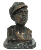 After M. Martin, a marble mounted bust of boy smok