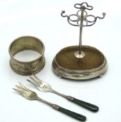 A 1931 London silver hatpin stand, 80g, a pair of 1912 Birmingham silver forks with jade handles, 12