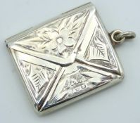 A 1918 Chester silver stamp holder by Albert Ernes