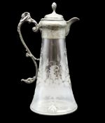 A Victorian etched claret jug with pewter fitting,