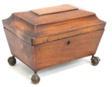 A Regency period sarcophagus shaped mahogany tea c
