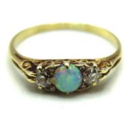 An antique 18ct gold ring set with opal & approx.