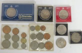 A 1935 George V 0.500 silver crown, two UK coin se