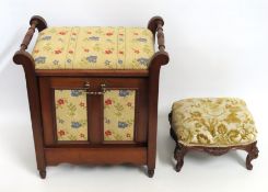 A mahogany music stool with pull down sheet storag