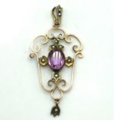 An Edwardian 9ct gold pendant set with amethyst &