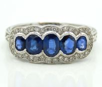 An 18ct white gold ring set with natural sapphire