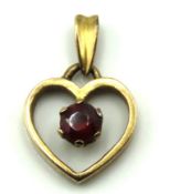 A 9ct gold pendant set with garnet, 19mm drop, 1.7