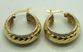 A pair of 9ct gold hoop earrings, 18.75mm diameter