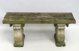 A garden pedestal bench, 1065mm wide x 461mm high