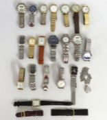 A quantity of gents fashion wristwatches including